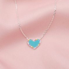 A mini heart-shaped Turquoise pendant is adorned with dozens of rainbow colored crystals for a beautiful expression of color. 🌈 The built-in extender makes this piece perfect for layering. Choose gold or silver. DETAILS 14kt gold plated or sterling silver Rainbow colored cubic zirconia crystals Turquoise enamel inlay Pendant measures 12mm across 16 inches long with a 3 inch extender Can be worn 16-19 inches Also comes in a Large Heart version and White Crystal Pave version. Crystals Turquoise, Turquoise Heart Necklace, Deer Jewelry, Turquoise Heart, Large Heart, Mini Heart, White Crystal, Turquoise Pendant, Color Crystal