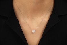 This Diamond Petal Necklace is crafted with natural white diamonds, creating a beautiful, radiant, and feminine look. Its petal design offers a timeless aesthetic, making it the perfect accessory to add a touch of elegance and sophistication to any formal ensemble. Dimensions:Chain length: 40 cm, adjustable up to 42 cm (approx. 15.7 to 16.5 in)Pendant: 1 cm in width (approx. 0.4 in) Materials used (pictured):18K solid white gold, 2.5 g10 x natural white diamonds Timeless Aesthetic, Feminine Look, White Diamonds, Lab Diamonds, Chain Lengths, Chain Length, Diamond White, Natural Diamonds, Limited Edition