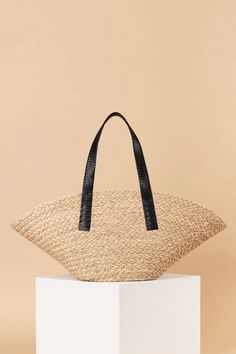 Introducing the Taco Tote -- our largest, luxest tote yet. Handwoven with vegetable dyed raffia in Rwanda, this basket took a master craftswoman over 6 days to weave. Finished with an intricately hand-braided Nappa Leather handle, from a centuries old Italian atelier, heralded for it’s world class quality and attention Artisan Weaving Straw Bag, Artisan Jute Straw Bag, Eco-friendly Straw Bag With Weaving Details, Eco-friendly Straw Bag With Weaving, Eco-friendly Straw Weaving Bag, Basket-shaped Straw Bag With Weaving Details, Eco-friendly Basket-shape Straw Bag With Weaving, Natural Basket-shape Straw Bag With Weaving, Natural Fiber Basket Straw Bag With Weaving