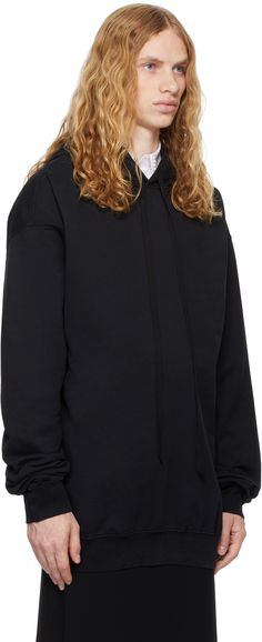 Oversized cotton jersey hoodie. · Drawstring at hood · Rib knit hem and cuffs · Dropped shoulders · Graphic printed at back · Grosgrain strap with logo plaque at interior Supplier color: Black Comfort Hoodie, Hoodie Oversize, Ann Demeulemeester, Embroidered Hoodie, Black Hoodie, Drop Shoulder, Printed Cotton, Rib Knit, Black White