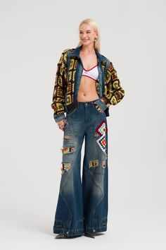 Welcome! 🌸 Add a touch of boho spirit to your wardrobe with this unique denim jacket! Each piece is carefully upcycled, featuring handmade colorful crochet sleeves that truly stand out. The combination of vintage jean fabric and bohemian details gives this jacket a modern yet timeless vibe. Whether you're heading to a festival or just want to elevate your everyday style, this jacket is perfect for making a statement. Plus, if you're looking for a truly unique gift for someone special, this jack Bohemian Denim Jeans For Fall, Bohemian Dark Wash Jeans For Fall, Hippie Patchwork Denim Jacket For Fall, Bohemian Denim Jacket With Pockets For Fall, Bohemian Patchwork Jeans For Fall, Fall Festival Outerwear With Boho Collar, Bohemian Dark Wash Denim Jacket For Spring, Hippie Denim Outerwear For Festivals, Festival Denim Patchwork Outerwear