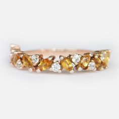 Citrine Wedding Band, Citrine Half Eternity Band, 925 Sterling Silver Band, Matching Band, Stacking Ring, Birthstone Ring, Gift For Women. 10K/14K/18K Rose, Yellow And White Gold. Main stone: Citrine ( Lab Created ) Stone Shape: Marquise Stone Size: 4x2 MM Stone Color: Yellow Birthstone: November Second Stone: CZ Diamond Stone Shape: Round Stone Color: White Jewelry Type: Ring Metal: Silver Method: Cast Personalization: Possible Style: Wedding Ring Set Ring Size: We make rings from US 3 to US 10. This elegant ring is perfect for any occasion like a party, wedding, engagement, etc. as it suits any outfit or with many emotions to express. Rhodium choice:- you can choose rose gold, Yellow Gold, Silver We only do nickel-free Rhodium which is friendly to the skin, We have all kinds of precious, Citrine Wedding Band, Citrine Wedding Ring, Citrine Wedding, Birthstone Band, Citrine Ring Engagement, Ring Birthstone, 14k Rose Gold Ring, Half Eternity Band, Citrine Ring