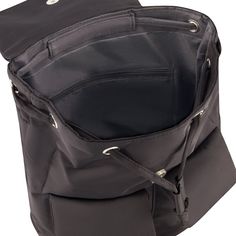 the inside of a black bag with zippers and straps on it's sides