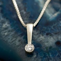 Long Bar pendant, featuring diamond set in a delicate, rounded bezel, made in 14k / 18k white gold. * Choose the chain length in the bar menu above. This listing is for WHITE GOLD. you can order other colors from the following links: ● Rose gold - https://www.etsy.com/listing/1117297640/ ● Yellow gold - https://www.etsy.com/listing/1098489720/ ♦ DIAMOND SPECIFICATIONS ♦ Carat Weight: 0.40ct Color: I + Clarity: SI + ♦ We work with high-quality diamonds, at the highest standards. ♦ The diamonds ar Gift Solitaire Pendant Necklace With Single Cut Diamonds, Solitaire Pendant Necklace With Single Cut Diamonds For Gift, White Solitaire Diamond Pendant Necklace, Diamond White Solitaire Diamond Pendant Necklace, White Gold Solitaire Pendant Necklace, Brilliant Cut, Solitaire Necklaces, Bar Pendant, Dainty Ring, Quality Diamonds