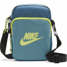 Nike Heritage Crossbody Small Utility Bag New With Tag's Nike Id: Cv1408-404 If You Have Any Questions Please Ask Before Purchasing. Check Out All Of Our Other Great Items B75 Nike Heritage Crossbody Bag. An Alternative To The Classic Hip Pack Style, The Nike Heritage Crossbody Bag Offers Hands-Free Storage In A Design You Wear Across The Chest. A Futura Logo Print And Easy-To-Adjust Strap Make It A Smart Pick For Everyday Use. The Main Storage Pocket And Accessories Pocket Help Keep Your Gear O