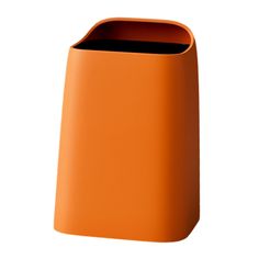 an orange trash can on a white background