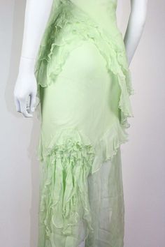 For Sale on 1stDibs - John Galliano silk dress in mint green, from the Fall/Winter 1995 'Delores' collection, a tribute to the Mexican actress Dolores del Rio. As seen on the Fitted Silk Chiffon Day Dresses, Fitted Silk Chiffon Dress For Daywear, Green Silk Chiffon Dress For Spring, Green Silk Chiffon Dress For Formal Occasions, Fitted Light Green Dress With Ruffles, Green Silk Dress, Green Silk Dresses, Mexican Actress, John Galliano