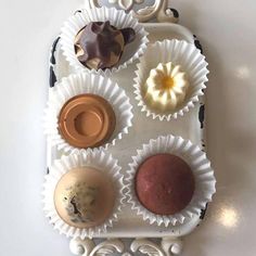 a tray with different types of pastries on it