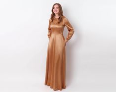 Gold dress with belt, bridesmaid dress, wedding guest dress, long ball gown, full length dress, custom lengths dress, evening dress, wedding cocktail party dress, party dress, cocktail dress You can find the pictures of ALL OTHER COLORS in our catalog on ETSY here: https://www.etsy.com/shop/ENMEstyle?ref=seller-platform-mcnav§ion_id=35708129 Model's height is 5'9" (175 cm) / Size US 6 / M ADJUSTMENTS  We can make any length adjustments special for you and for free! The sizing forgives plus-minus Luxury Full-length Bridesmaid Evening Dress, Luxury Full Length Bridesmaid Dresses, Luxury Belted Evening Dress, Luxury Full-length Stretch Gown, Golden Bridesmaid Dresses Long Sleeved, Luxury Stretch Full-length Evening Dress, Luxury Full Length Green Gown, Satin Dress With Belt, Dresses Wedding Guest