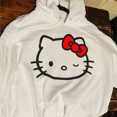 Hello Kitty White Hoodie Oversized Xl. Nwt In Excellent Condition. Super Cute And Comfy Hoodie With Front Pocket. Hello Kitty Oversized Hoodie, Oversized Kawaii Hoodie For Streetwear, Hello Kitty Print Hooded Hoodie For Winter, Hello Kitty Print Winter Hoodie, Hello Kitty Print Hooded Winter Hoodie, Casual Hello Kitty Hooded Sweatshirt, Kawaii Oversized Hoodie Top, Casual Hooded Hello Kitty Sweatshirt, Oversized Kawaii Hoodie Top