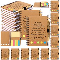 a spiral notebook with sticky notes, pens and stickers next to it are all lined up