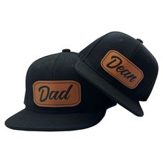 "These custom name hats are the coolest accessories for Father's/Mother's and Sons/Daughters! Featuring a vintage font, the personalized name is added onto a vegan leather patch in your choice of color.  ** Our hats are custom, made to order. Please make sure the name is spelled correctly and written exactly how you want it displayed on the hat. We do not accept returns on personalized orders. ** SIZING: - Infant cap measures approximately 48cm in circumference (0-3 years old) - Child cap measur Adjustable Snapback Hat With Letter Print And Flat Brim, Adjustable Flat Brim Snapback Hat With Letter Print, Adjustable Fitted Cap With Letter Print, One Size Fits Most Dad Hat For Father's Day, Outdoor Hats With Letter Patch And Curved Brim, Outdoor Hat With Curved Brim And Letter Patch, Outdoor Hats With Curved Brim And Letter Patch, Adjustable Cap With Letter Patch, Black Hats With Letter Print For Gifts