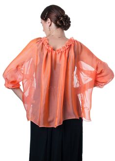 "Gorgeous sheer bolero jacket, with a loose-fitting silhouette is made of finest 100% silk iridescent chiffon in bright coral orange color with delicate rosy shade This short bolero jacket is fully draped, has raglan sleeves and drawstring collar that forms a corolla. This Jacket has loose silhouette. One size fits two. S-M Bust 32-36 inches L-XL: Bust 38-42 inches Fabric: 100% silk iridescent chiffon 6mm Color: #602 Coral Also available in 34 different colors Product images/colors are for refer Spring Orange Silk Top, Orange Silk Top For Spring, Orange Silk Tops For Spring, Elegant Peach Tops For Party, Spring Evening Silk Chiffon Blouse, Orange Silk Blouse For Spring, Chiffon Bolero, Silk Clutch, Wedding Shrug