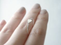 Silver heart ring - sideways heart - delicate and dainty illusy jewelry. $25.00, via Etsy. Simple Heart-shaped Midi Promise Ring, Simple Heart Midi Rings, Tiny Delicate Heart Promise Ring, Delicate Tiny Heart Promise Ring, Minimalist Heart-shaped Stackable Wedding Rings, Delicate Heart Promise Ring, Simple Everyday Heart Midi Rings, Dainty Stackable Rings Gift, Dainty Stackable Rings As Gift