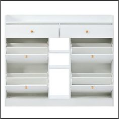 an open white cabinet with drawers and shelves