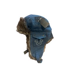 Stay Warm And Stylish This Winter With This True Religion Trapper Hat. The Faux Fur And Cotton Material Will Keep You Cozy, While The Denim Fabric Type Adds A Touch Of Classic Style. The Solid Pattern And Blue Color Make It A Versatile Accessory For Any Casual Occasion. This One Size Fits All Hat Features Lined Ear Flaps And Insulation, Making It Perfect For Outdoor Activities During The Winter Season. The Horseshoe Pockets Add A Unique Touch To The Design, Making It A Must-Have For Any Designer Trapper Hat Pattern, Fur Trapper Hat, Denim Cap, Trapper Hat, Trapper Hats, Fur Hat, Lucky Girl, Hat Pattern, Solid Pattern