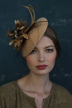 Lovely Light Beige Velour Fascinator with a Velvet Flower by DIVA HATS. Lovely light beige velour fascinator with a velvet flower. Women head accessories for weddings, routs, parties, derby. Ready-to-wear hats that respond to all the latest trends in fashion. Fascinator hats are highly detailed accessories that accentuate your outfits with a subtle charm and elegance. It resembles a hat but is much smaller and unpretentious. This is very comfortable - one size fascinator holds on a headband Beige Headpiece For Kentucky Derby Event, Handmade Flowers Fascinator For Formal Occasions, Formal Mini Hats With Handmade Flowers, Elegant Fitted Brown Headpiece, Elegant Fitted Flower Costume Hats And Headpieces, Elegant Fitted Flower Headpieces, Beige Headband Fascinator, Elegant Handmade Flowers Headpiece For Events, Elegant Headpieces With Handmade Flowers For Events