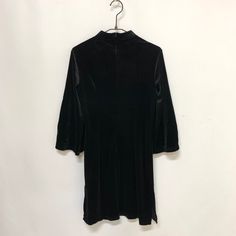 A Chinese dress made of velour material with an embroidered design.

 There is a zip on the back for easy removal.



・Shoulder width 34cm

 Width: 41.5cm

 Length: 84cm

 Sleeve length: 41cm

 standard

 ■ Country of Origin: China

 ■Material: 90% polyester

 10% Polyurethane



 Notes

 ■About size

 Actual dimensions are measured when laid flat. Please note that there may be slight differences depending on the material.


 
■About color

 Please note that the colours of the actual product ma Winter Mini Velvet Dress, Black Velvet Knee-length Dress, Black Fitted Knee-length Velvet Dress, Velvet Knee-length Mini Dress For Night Out, Mini Velvet Dresses For Fall, Black Velvet Mini Dress For Fall, Vision Street Wear, Tight Mini Dress, Chinese Dress