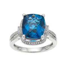 a cushion cut blue topazte and diamond ring