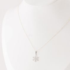 This stunning Silver Snowflake Necklace is a must-have for any winter lover! The delicate and dainty snowflake design adds a touch of elegance to any outfit, making it the perfect accessory for the holiday season. Show off your unique style with this minimalist piece of jewelry, which is sure to make a statement and turn heads. Treat yourself or a loved one to this beautiful Winter Necklace today! • Material: High Quality Sterling Silver 925• Featuring a 10mm Snowflake with chain 16 inches• Waterproof Jewelry• Nickel Free Snow Necklace, Winter Necklace, Snowflake Necklace, Snowflake Design, Silver Snowflakes, Waterproof Jewelry, Gold Piece, Snowflake Designs, Outfit Making