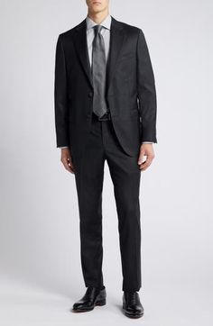 A subtle glen plaid woven in black and dusky greys distinguishes a versatile, all-occasion wool suit that's styled with traditional detailing from the notched lapels to the flat-front trousers. Jacket has notched lapels; four-button cuffs; chest pocket; flap pockets; interior pocket; side vents Trousers have zip fly with button-tab closure; flat front; slant pockets; back button-welt pockets Jacket is lined Trousers are unhemmed 100% wool Dry clean Made in Italy Tailored Black Wool Three-piece Suit, Elegant Black Wool Double Breasted Suit, Semi-formal Black Double Breasted Suit With Concealed Placket, Classic Black Double Breasted Suit With Concealed Placket, Timeless Black Suit With Hidden Button Closure, Black Wool Suit For Business Casual, Black Wool Business Casual Suits, Luxury Black Suits With Concealed Placket, Elegant Black Suits With Concealed Placket