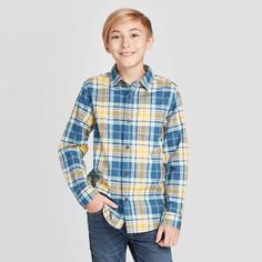 Cat & Jack Boys' Long Sleeve Multicolored Plaid Button-Down Shirt Gear up his wardrobe for dressier weekends with this Blue Long-Sleeve Plaid Button-Down Shirt from Cat & Jack. This boys' long-sleeve shirt makes a smart-casual addition to his clothing wardrobe. Made from a breathable cotton fabric to keep him cool and comfortable, this cozy long-sleeve shirt features a collared neckline, round-cut cuffs and a button-down front for easy wear. The plaid check design in shades of blue and yellow ad School Cotton Shirt With Button Closure, Multicolor Long Sleeve Shirt For School, Boys Puffer Jacket, Clothing Wardrobe, Check Design, Blue Cat, Cat And Jack, Cheque Design, Henley Shirt