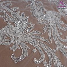 Price: The price is for 1 yard. if you buy more than 1 yard ,it won't be cut. will come in one piece the longest is 20 yards. Material: polyester,sequins,beads Fixed Wide : 100cm or 36 inches. color:silver Want to see other colors and more similar Beading lace fabrics come to: https://www.etsy.com/shop/Randyfabrics?ref=hdr_shop_menu&section_id=14192305 Shipping: Choose the shipping way you need, if you want package shipped by express,please note the phone number on order. Use for Dress,cloth Elegant White Embellished Tulle Fabric, Elegant Lace Tulle Fabric With Pearl Embroidery, Elegant Silver Lace With Sequins, Elegant Silver Lace With Intricate Embroidery, Elegant White Sequin Fabric With Delicate Lace, Elegant Silver Embroidered Fabric With Lace Work, Elegant Sequin Lace Fabric, Elegant Silver Lace Embroidered Fabric, Elegant Silver Embroidered Lace Fabric