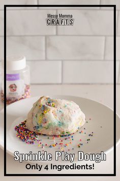 sprinkle play dough on a white plate