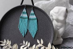 Turquoise Fringe Earrings For Summer, Elegant Turquoise Beaded Earrings For Summer, Turquoise Beaded Fringe Earrings For Summer, Summer Beaded Fringe Chandelier Earrings, Turquoise Beaded Tassel Earrings For Summer, Summer Turquoise Beaded Tassel Earrings, Elegant Turquoise Beaded Earrings With Fringe, Turquoise Beaded Fringe Tassel Earrings For Summer, Trendy Turquoise Beaded Drop Earrings