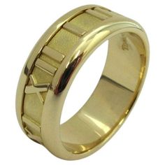 TIFFANY & CO. Atlas 18K Yellow Gold Numeric Ring 6.5 Metal: 18K Yellow Gold Size: 6.5 Band Width: 7mm Weight: 7.90 grams Hallmark: TIFFANY&CO.©1995 750 ITALY Condition: Excellent condition, like new Limited edition, no longer available for sale in Tiffany stores Authenticity guaranteed Luxury Gold Engraved Ring With Hallmarks, Luxury Gold Bands With Polished Finish, Luxury Gold Round Band Rings, Luxury Engraved Wide Band Ring In Yellow Gold, Luxury Yellow Gold Wide Band Engraved Ring, Luxury Gold Rings With Open Band, Luxury Wide Band Engraved Yellow Gold Ring, Luxury Gold Open Band Rings, Luxury Yellow Gold Couple Rings With Polished Finish