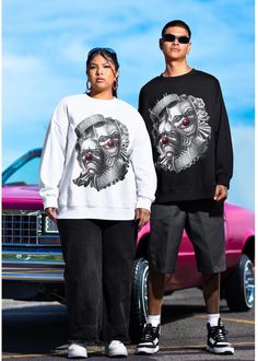 This Unisex Heavy Blend™ Crewneck Sweatshirt features a Smile now Cry later design, perfect for fans of Lowrider Art and Chicano style. This sweatshirt is relevant for fans of Cholos, cholas, and Latin culture, perfect for casual wear or as a statement piece. Ideal for gifting during cultural celebrations and observances. Product features - Medium-heavy fabric blend of 50% cotton and 50% polyester - Classic fit with crew neckline for comfortable wear - Double-needle stitching for durability - Et Oversized Sweatshirt With Character Print And Long Sleeves, Oversized Long Sleeve Sweatshirt With Character Print, Hip Hop Long Sleeve Sweater With Graphic Print, Character Print Hoodie For Streetwear, Oversized Sweatshirt With Character Print For Streetwear, White Long Sleeve Sweatshirt With Front Print, Winter Crew Neck Sweatshirt With Front Print, Winter Sweatshirt With Front Print And Long Sleeves, Long Sleeve Winter Sweatshirt With Front Print