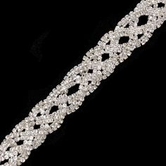 a diamond bracelet on a black background