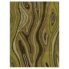 a green rug with wavy lines on it