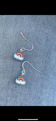 Cute little Polymer Clay Rainbow Earrings, perfect for celebrating the upcoming Pride Celebrations. They have silver plated hypo allergenic ear hooks and are ready made and ready to post once purchased If you are not 100% satisfied with your purchase, I offer refunds and accept returns for up to 30 days from the sale and issue a full refund provided the item is returned within 30 days. Polymer Clay Rainbow Earrings, Polymer Clay Rainbow, Clay Rainbow, Pride Earrings, Pride Jewellery, Quirky Earrings, Earrings Polymer Clay, Rainbow Earrings, Ear Hook