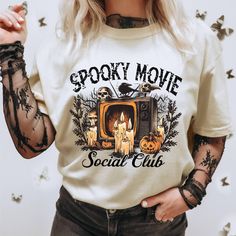 Spooky Movie Social Club Shirt,Funny Halloween Social Club  Comfort Colors Shirt,Spooky Season Horror Movie, Trendy Halloween ,Retro Halloween  Shirt,Spooky University,Vibes Halloween 🌟 Welcome to our premium t-shirt collection, where comfort meets quality effortlessly!🌟 🌟 ABOUT THE FEATURES🌟  We use DTF (Direct to Film) printing as our printing technique. Our t-shirts are designed for your convenience; simply machine wash them inside out to maintain their pristine quality. Avoid tumble dryi Retro Halloween T-shirt With Character Print, Vintage Halloween T-shirt With Letter Print, Vintage Halloween Character Print Top, Vintage Halloween Tops With Character Print, Vintage Halloween T-shirt With Character Print, Retro Halloween T-shirt With Crew Neck, Horror Graphic Print Top For Costume Party, Spooky Halloween Top With Letter Print, Retro Funny Print Halloween Tops