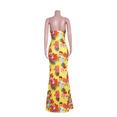 Boho Beach Floral Print Cut Out Floor Length Dresses Multicolor Dress For Holiday Vacation, Multicolor Floral Print Maxi Dress For Holiday, Multicolor Holiday Dress For Vacation, Holiday Multicolor Floral Print Maxi Dress, Tropical Printed Dresses, Sleeveless Dress With Tropical Print For Holiday, Yellow Floral Print Vacation Dress, Yellow Tropical Sundress For Vacation, Tropical Maxi Party Dress