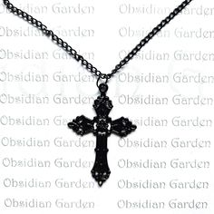 Gothic black ornate cross pendant necklace. All black with black enamel coating. Solid black plated chain with lobster clasp fastening. Chain length 60cm/23 1/2 inches. Pendant 60 x 32mm (measurements are approximate). On dispatch this item will be carefully wrapped in tissue paper before being sent in a padded envelope for extra protection. Free delivery in the UK. Ornate Cross, Black Plates, Cross Pendant Necklace, Black Enamel, Cross Pendant, Chain Lengths, Chain Length, Tissue Paper, Solid Black