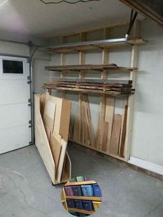 a garage filled with lots of wooden boards