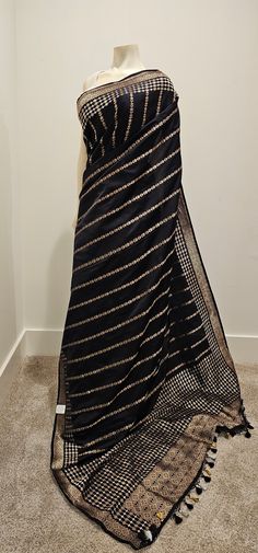 Beautiful Black Satin Banaras Silk Saree w/ Pure Zari w/ Blouse, Product ships immediately within the US. Formal Silk Pre-draped Saree With Zari Weaving, Elegant Formal Pre-draped Saree With Zari Weaving, Formal Black Pre-draped Saree With Resham Embroidery, Silk Traditional Wear With Sheer Dupatta For Evening, Traditional Evening Lehenga In Chanderi, Festival Evening Tissue Silk Saree, Elegant Evening Traditional Wear In Tissue Silk, Silk Dupatta With Zari Work For Evening, Evening Silk Dupatta With Zari Work