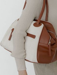 Editor's NotesCHRISTINE PROJECT's signature designed canvas bag can be matched with any casual outfits.- Sophisticated and casual mood- Mix-match of canvas and leather- Waterproof canvas fabric- Enough storage space- Daily point itemMeasurements(in.)One size (Unisex)- Body : 15.35 in. (W) * 9.84 in. (H) * 7.48 in. (D)- Handle : 7.48 in.- Weight : 1.54 lbComposition & Care- Vegan leather, Canvas- Natural leather may have fine scratches and wrinkles- Bright-toned leather can get colored by den Modern Brown Canvas Bag For On-the-go, Chic Coated Canvas Bag For On-the-go, Trendy Canvas Bag For Errands, Chic Canvas Bag For On-the-go, Versatile Canvas Satchel For Errands, Beige Shoulder Bag With Leather Trim For On-the-go, White Shoulder Bag With Leather Trim For On-the-go, Beige Canvas Bag For On-the-go, Modern Coated Canvas Shoulder Bag For Errands