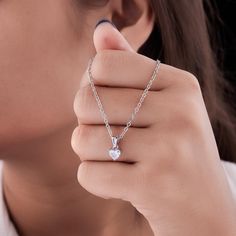 Check out our Heart Shape Diamond Pendant for a touch of unmatched elegance. With options of 10k, 14k, or 18k White, Rose, or Yellow Gold, you can find the perfect match for your style. The pendant's got a stunning 0.5 carat lab-grown diamond that'll shine bright with its F+ color and VS+ clarity. Each diamond gets a thorough polish to make sure it sparkles like crazy. You'll love how radiant and unforgettable this piece is.. Key Features: Diamond: 0.5 CT Heart Shape Diamond (Lab Grown) Color Grade: F+ Clarity Grade: VS+ Polish: Excellent Metal Options: 10k, 14k, or 18k White, Rose, or Yellow Gold It's the perfect accessory to dress up any outfit and make you feel like royalty. Whether you're looking for a special gift for someone you love or just want to treat yourself, this pendant is su Heart Cut Solitaire Necklace With Diamond Accents For Gift, Heart Cut Diamond White Solitaire Necklace, Heart Cut Solitaire Necklace With Diamond Accents, Heart Cut Solitaire Necklace For Wedding, Elegant Heart Shaped Solitaire Necklace, Dainty White Solitaire Necklace For Anniversary, Minimalist Heart Cut Jewelry For Formal Occasions, Minimalist Heart Cut Formal Jewelry, Diamond White Solitaire Necklace Gift