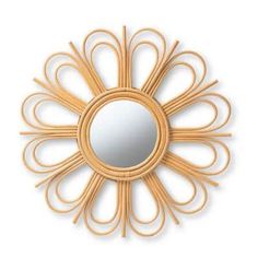 a mirror that is shaped like a flower