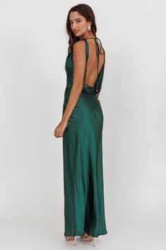 Satin maxi dress Backless Invisible side zipper Cowl neckline You'll look like you just stepped straight off the red carpet in our gorgeous Cassiopeia dress. Featuring a cowl neckline and an open, draped back. It's perfect for a wedding or special birthday celebration. Team it with diamante heels and a clutch for a show stopping look. MODEL INFO Model is wearing size XS Height: 5'8" Bust: 31.0" Waist: 24.0" Hips: 35.0" CARE Hand Wash Cold. Do Not Iron. MATERIAL POLYESTER Sleek Tie Back Dress For Date Night, Sleek Tie-back Dress For Date Night, Chic Maxi Dress With Cowl Back For Party, Chic Bias Cut Maxi Dress For Prom Season, Green Draped Maxi Dress For Gala, Maxi Length Tie Back Dress For Night Out, Prom Season Maxi Evening Dress With Tie Back, Sleek Tie-back Maxi Dress For Party, Prom Season Evening Dress With Tie Back