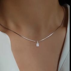 -Cz Cubic Zirconia Diamond -Radiant Cut Petite Rectangle Pendant -Chain Is Silver Plated Over Stainless Steel. Chain Is Hypoallergenic Waterproof And Will Not Fade Or Tarnish. -Length Of Chain Is Approximately 16”+2” Extension. * Also Have This Necklace In Silver! Pictured Above! Automatic 25% Discount And On Bundles Of 2 Or More Items From My Closet Or Make Your Own Bundle And Send Me An Offer. Bohemian,Chic,Elegant,Trendy,Sparkly,Stamped 925, 18k 14k Pink 10k Melting,Dripping,Anthropology,Anth Petite Rectangle, Floral Pendant Necklace, Rectangle Pendant, Snake Chain Necklace, Circle Diamond, Diamond Chain, Square Diamond, Birthday Wishlist, Feather Necklaces