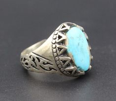 Unique Turkish silver ring. Beautiful natural Turquoise stones with adorable carved workmanship. Please do not hesitate to contact if you have any questions about items or further information. Measures :  Size of the ring : 10 US Jewelry Ring Mandrel, Weight : 8.7 Grams, Ring Mandrel, Natural Turquoise Stone, Turquoise Stones, Ring Oval, Multi Stone Ring, Jewelry Ring, Natural Turquoise, Multi Stone, Turquoise Stone