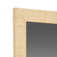 a wooden frame with a mirror on top of it