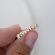 This beautiful cubic zirconia stacking ring is available in gold or sterling silver. It is elegant and great as as wedding band, as a stacking ring, or as a gift to a best-friend, wife or yourself! Simple stunning! - - - D E T A I L S - - - * Made of 925 Sterling Silver * THICK plating of 14k Gold or Rhodium * Available in Sizes 4-10 * Made of highest quality cubic zirconia * VERY HIGH QUALITY * Nickel-free & Hypoallergenic - will NOT turn fingers green! * Small stones: 1.5mm Large stones: 2.5mm Ring Sizer Tool https://samijewels.etsy.com/listing/1240904225 🎁 Comes in a gift-box, ready for gift giving!  ✈️ Ships same day for fast delivery!  ♡ Made with 100% Pure Love!  🥰 Happy to answer any questions you may have!  🤗 Let's Connect!  IG: samijewels_ White Dainty Stackable Rings, Luxury Minimalist Diamond White Stackable Rings, Luxury Dainty Stackable Rings For Formal Events, Luxury Minimalist Stackable Diamond White Rings, Luxury Minimalist Stackable Rings For Formal Occasions, Luxury Dainty Midi Rings As Gift, Fine Jewelry Cubic Zirconia Stackable Half Eternity Rings, Delicate Cubic Zirconia Ring With Diamond Accents, Stackable Yellow Gold Midi Rings With Cubic Zirconia