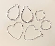 "Silver Teardrop Hoop Earrings  , Silver Heart Hoop Earrings , Large , Medium , Boho Silver Hoop Earrings , Jewelry For Women/Girls Teardrop Earrings have Silver and 3/4 of the Earrings have a twist design and hang 2\" Long Large Heart Earrings have a twisted effect as well through the whole earrings and hang 2\" Long Medium Heart Earrings have a double twisted Earring and hang 1 1/4\" Nice to compliment any outfit !  Earrings  are 1 3/4 \" in diameter I do not accept returns. Sales are final !" Teardrop Hoop Earrings, Hoop Earrings Large, Hoop Earrings Silver, Heart Hoop Earrings, Large Heart, Great Birthday Gifts, Jewelry Earrings Hoops, Silver Hoops, Jewelry For Women