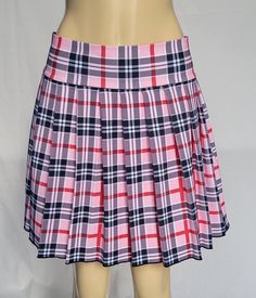 "JUNIOR to PLUS SIZE \"Strawberry\" PLAID LONG SKIRT 18\"-20\" LONG. (Strawberry) TO ENSURE YOU ORDER THE CORRECT SIZE SKIRT, PLEASE READ THIS  CAREFULLY; THEN MATCH IT WITH SIZES. ALL OUR SKIRTS ARE ALWAYS MADE WITH A 3\" LONG WAITSBAND + THE LEGNTH OF THE SKIRT. OUR SKIRTS ARE ALL MADE TO ORDER AND THE LENGTH MAY SLIGHTLY CHANGE A FEW CENTIMETERS, BUT WE TRY TO BE AS ACCURATE AS POSSIBLE.  BELOW IF THE FINAL LENGTH OF THE SKIRT. *XSMALL - Waistband measures 28\" around when fully closed. Skirt Pink Stretch Short Skirt, Stretch Pleated Pink Bottoms, Stretch Pink Pleated Bottoms, Pink Stretch Pleated Bottoms, Pink Stretch Mini Tennis Skirt, Fitted Pink Pleated Skort, Preppy Stretch Mini Skirt, Preppy Pleated Pink Skort, Stretch Preppy Pleated Skirt