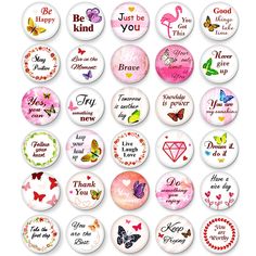 a bunch of buttons with different sayings on them, all in pink and white